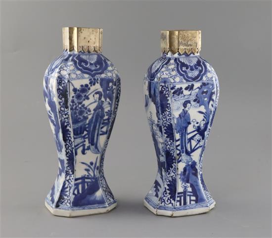 A pair of Chinese blue and white canted rectangular baluster vases, Kangxi period, H.26.7cm, one neck with section lacking obscured by